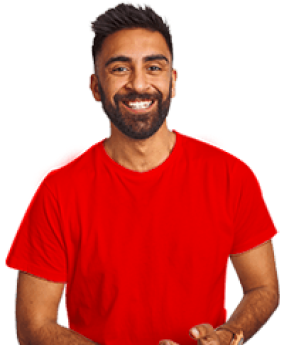 A smiling man in a red t-shirt